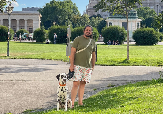 Amichai Teumim with his dog outside.